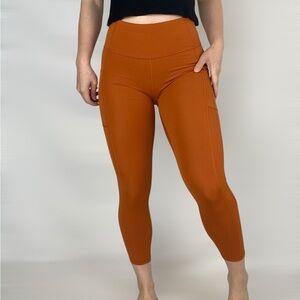 ATHLETA Ultimate Stash 7/8 Tight Petite Pocket Stretch Oxford Rust Gym Yoga‎